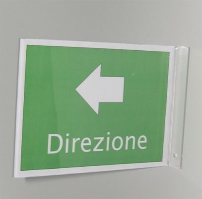 Example of wall-mounted sign holder for signage